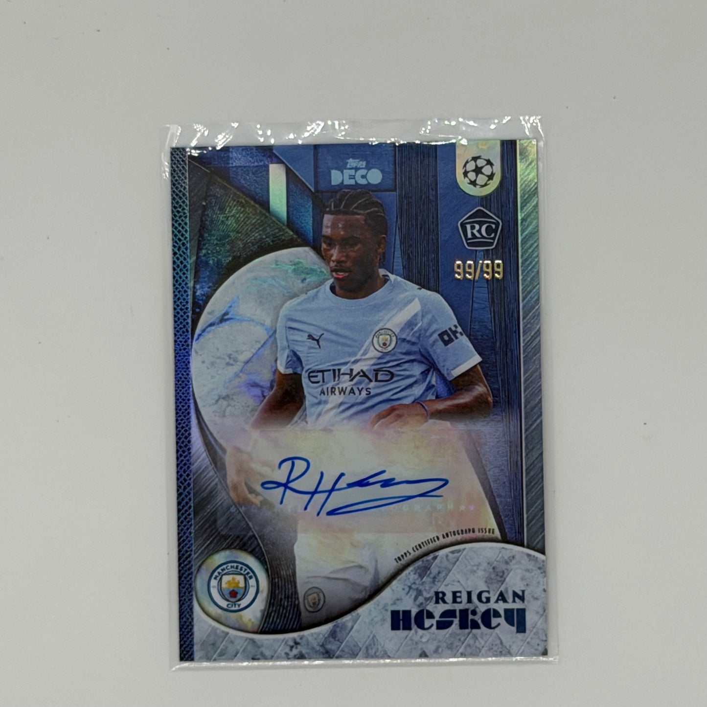 Reigan Heskey Man City UCL Soccer Topps 2025 Deco Auto /99